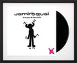 emergency on planet earth album cover with vinyl record framed by artist tboy